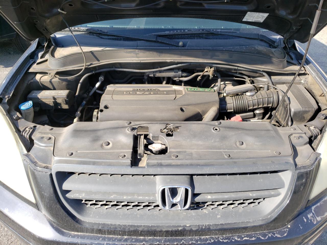 Photo 7 from auction – 2004 HONDA PILOT LX with VIN 2HKYF18174H586662