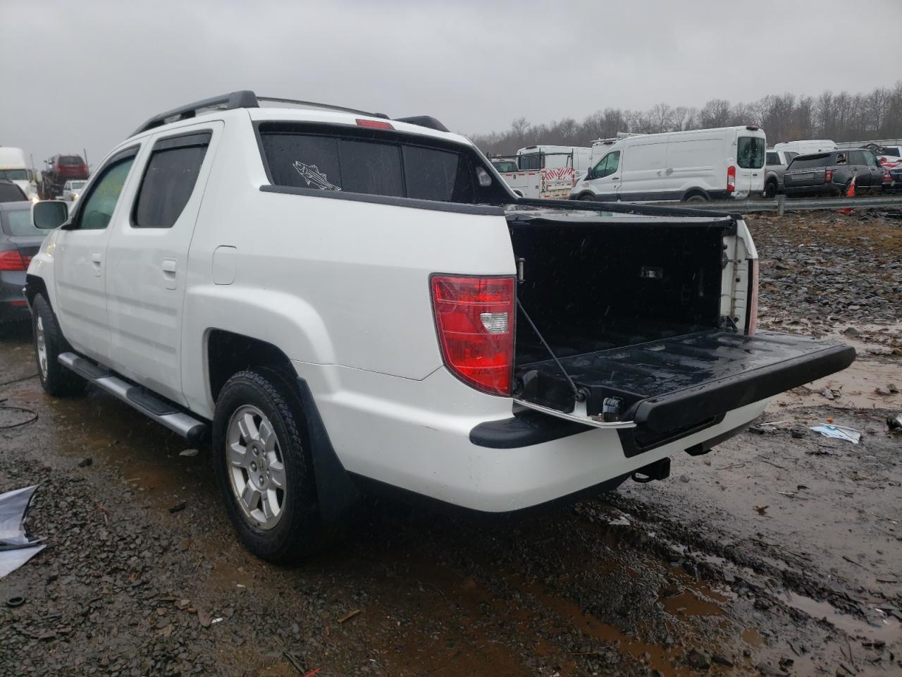 Photo 3 from auction – 2011 HONDA RIDGELINE with VIN 5FPYK1F45BB001850