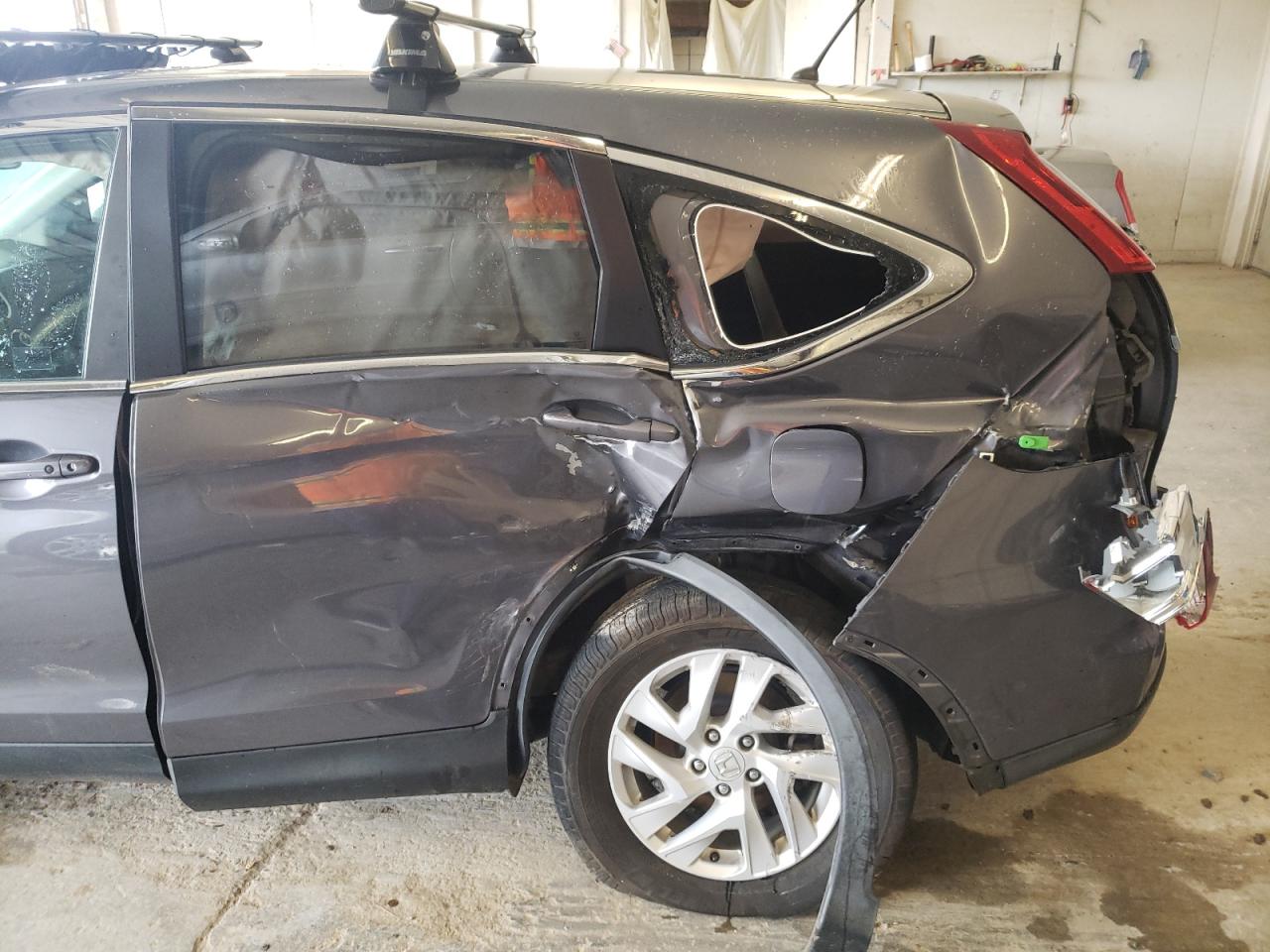 Photo 9 from auction – 2016 HONDA CR-V EX with VIN 2HKRM3H59GH566104