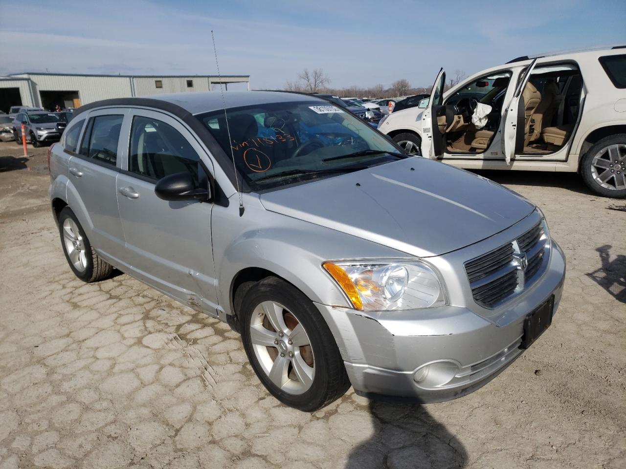 DODGE CALIBER MA 2011 with VIN 1B3CB3HA0BD118133 - Photo from auction