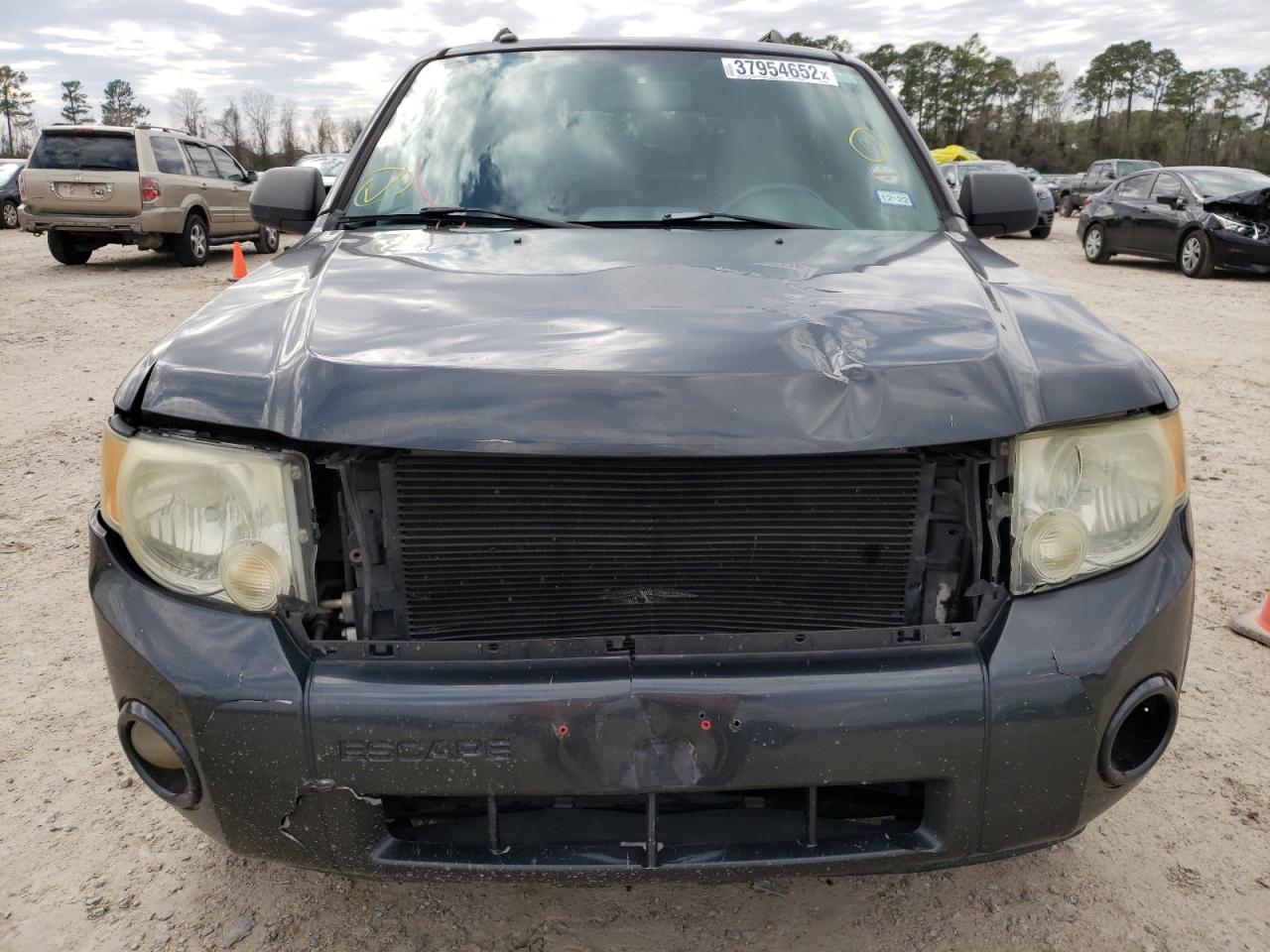 Photo 9 from auction – 2008 FORD ESCAPE XLT with VIN 1FMCU03108KC69102