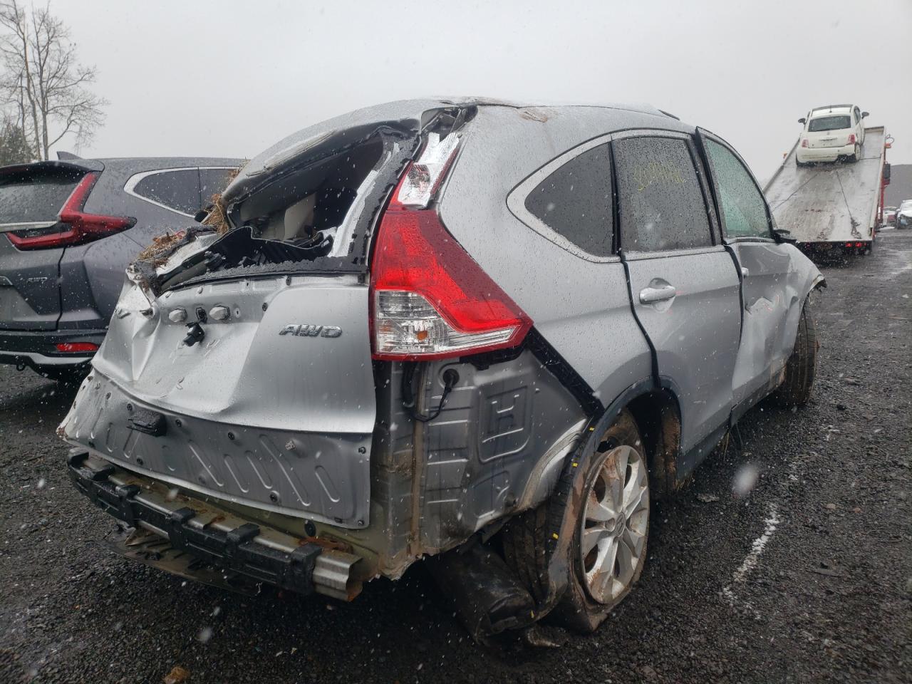 Photo 4 from auction – 2014 HONDA CR-V EX with VIN 5J6RM4H54EL004698
