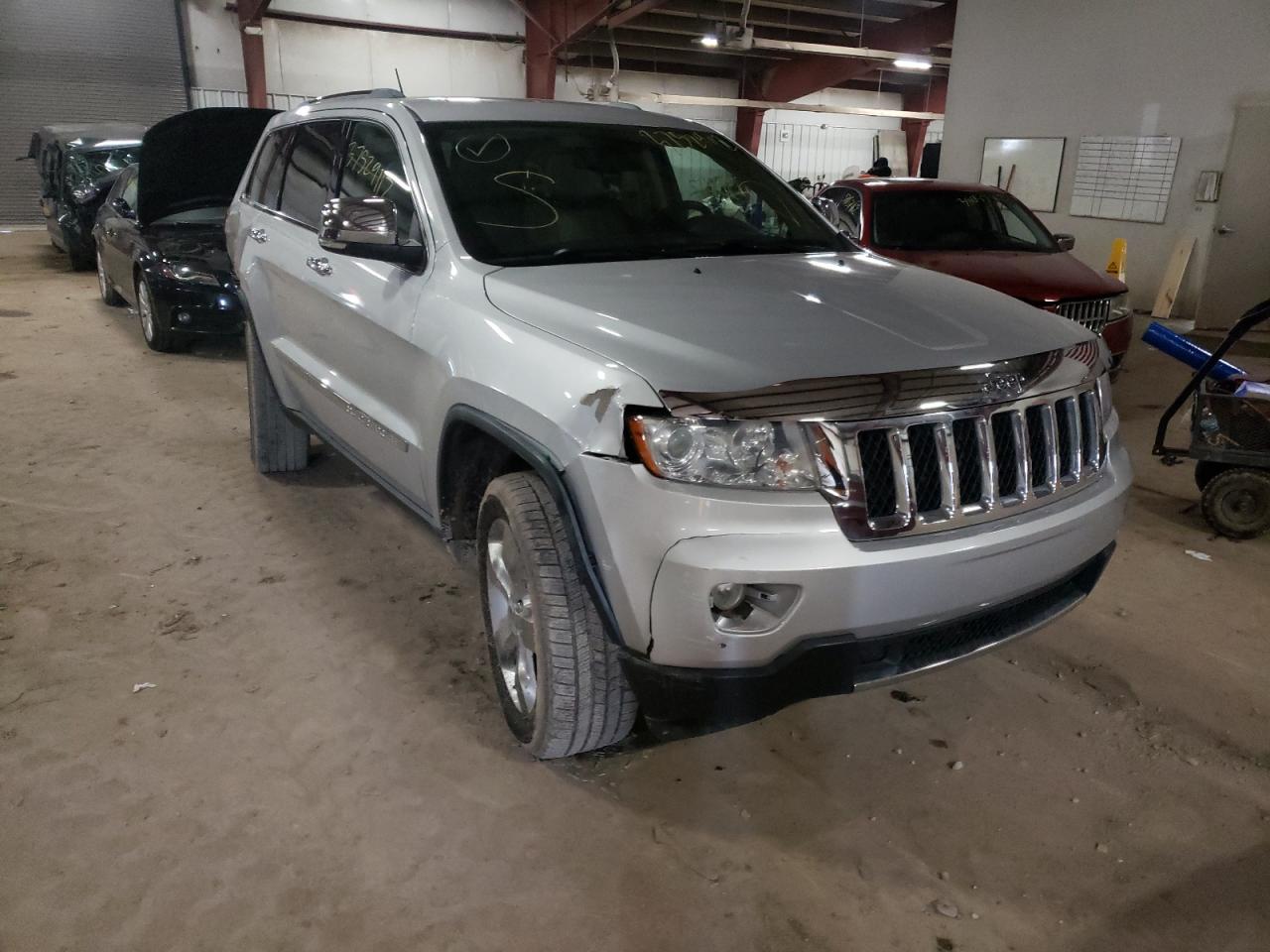 JEEP GRAND CHER 2011 with VIN 1J4RR6GT9BC586449 - Photo from auction
