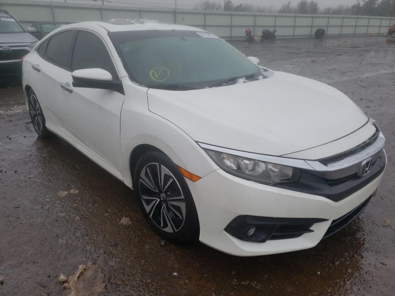 HONDA CIVIC EX 2016 with VIN 2HGFC1F33GH631843 - Photo from auction