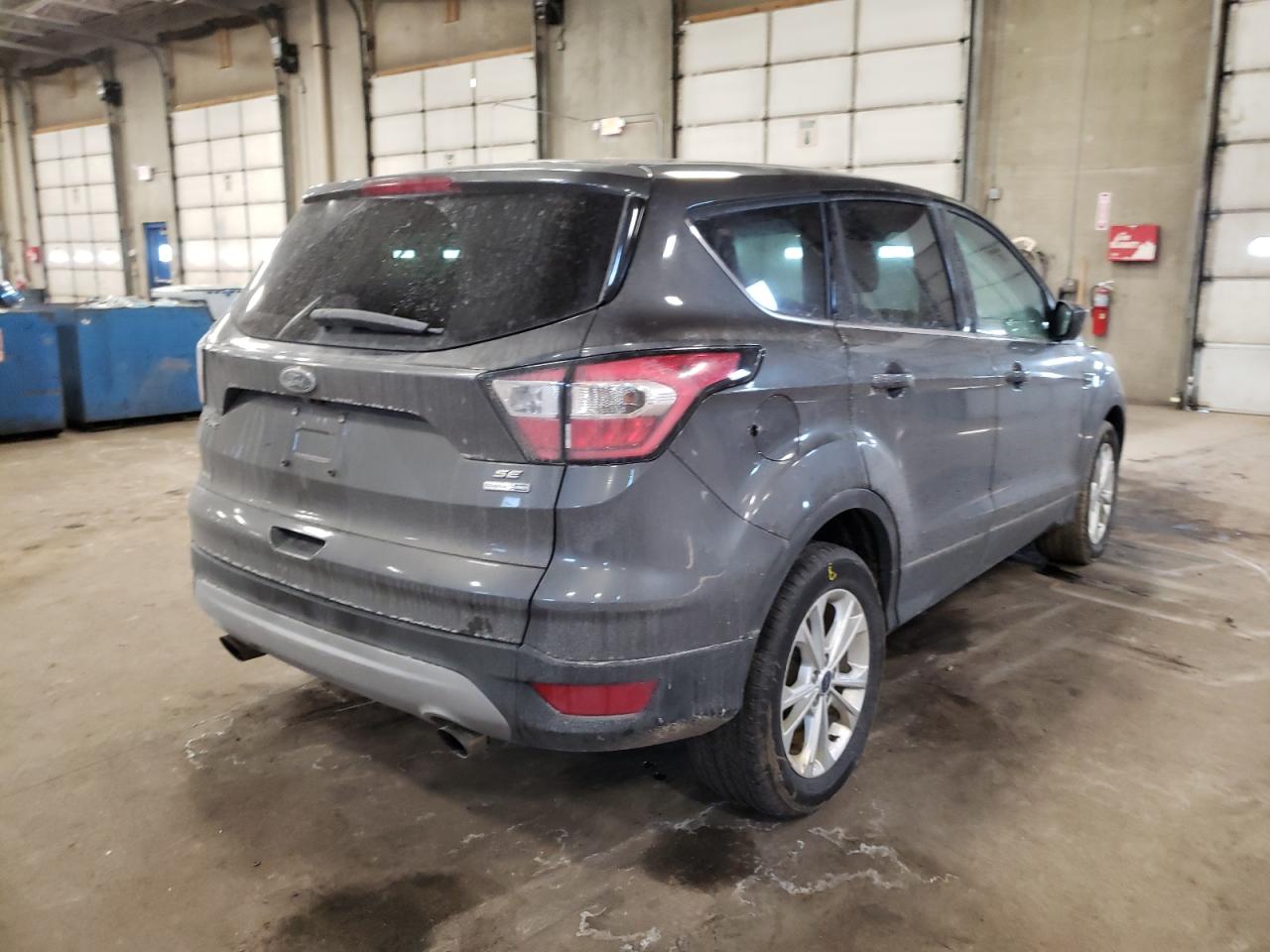 Photo 4 from auction – 2017 FORD ESCAPE SE with VIN 1FMCU9GD9HUB80786