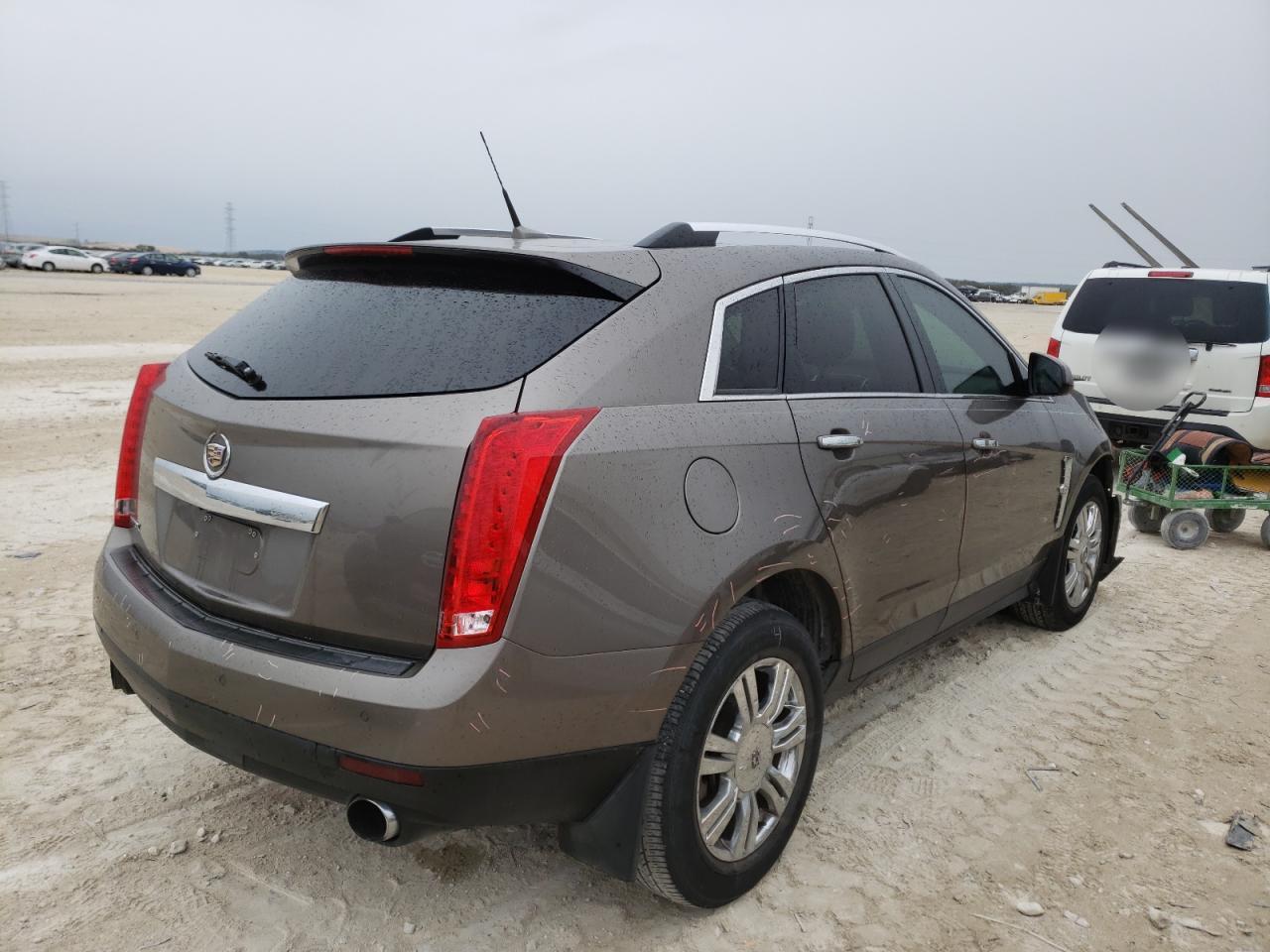 Photo 4 from auction – 2011 CADILLAC SRX LUXURY with VIN 3GYFNAEY8BS581902