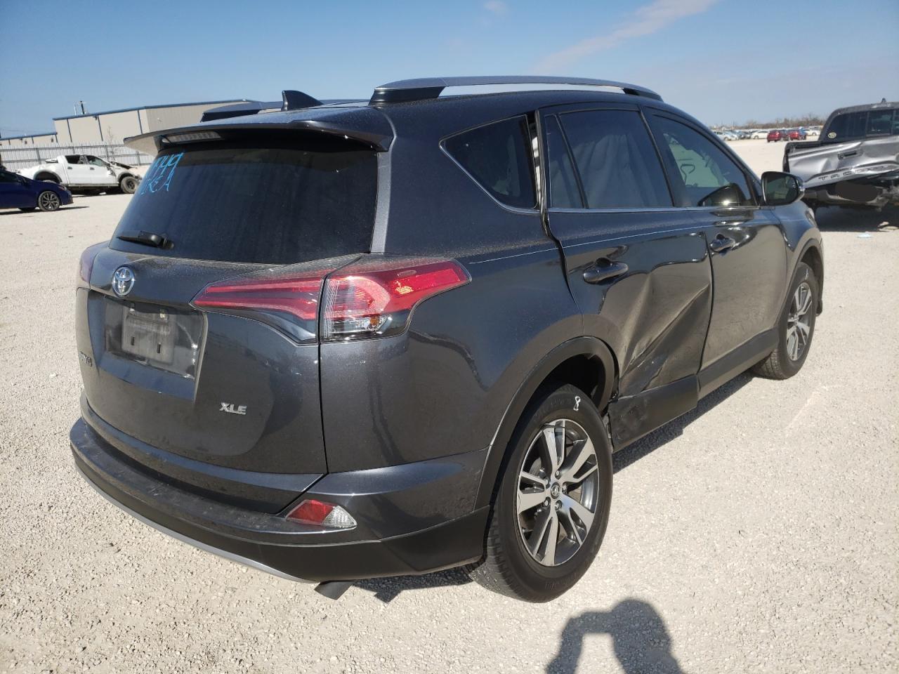 Photo 4 from auction – 2017 TOYOTA RAV4 XLE with VIN JTMWFREV5HD098433