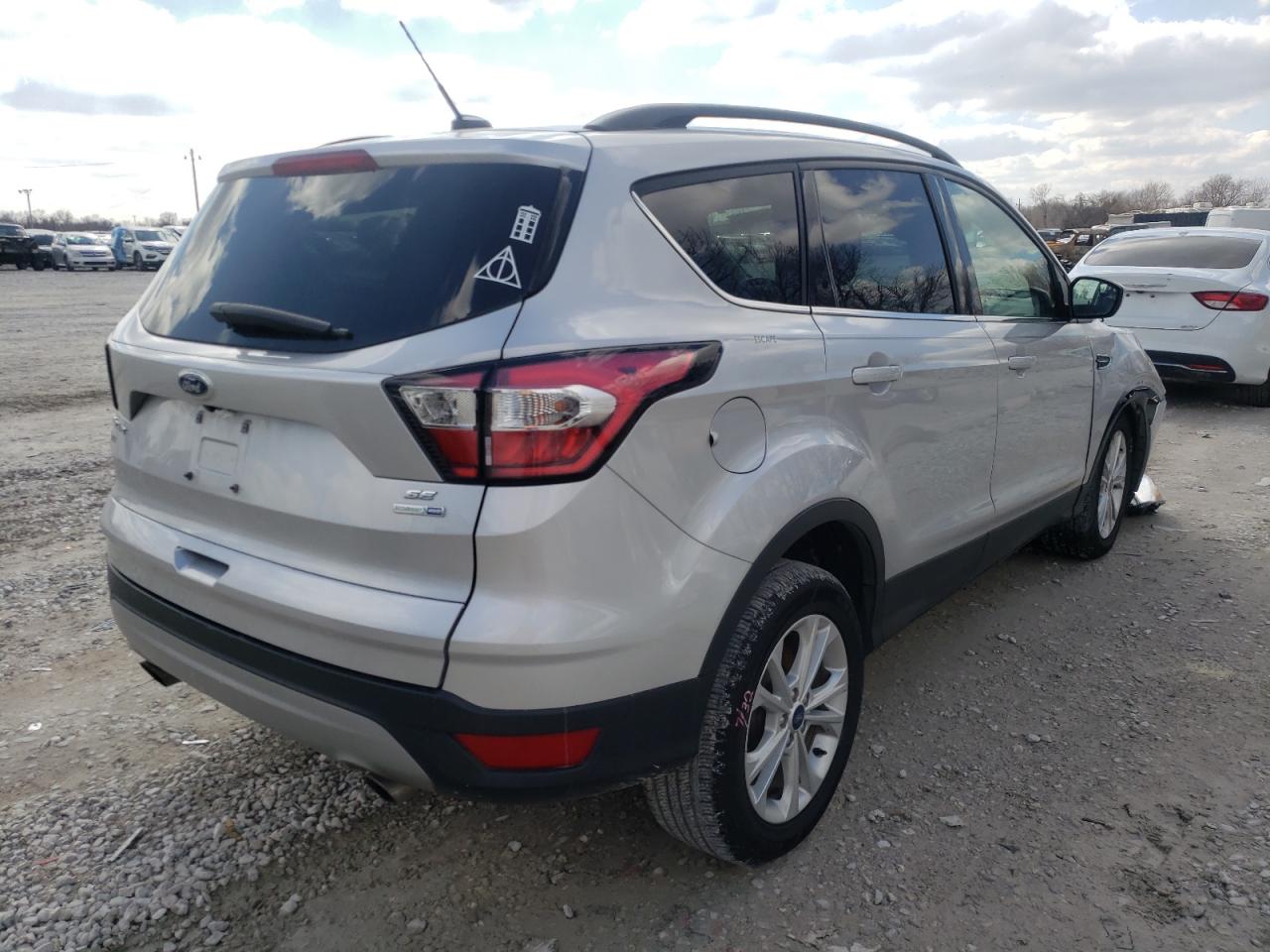 Photo 4 from auction – 2018 FORD ESCAPE SE with VIN 1FMCU9GD1JUD20996