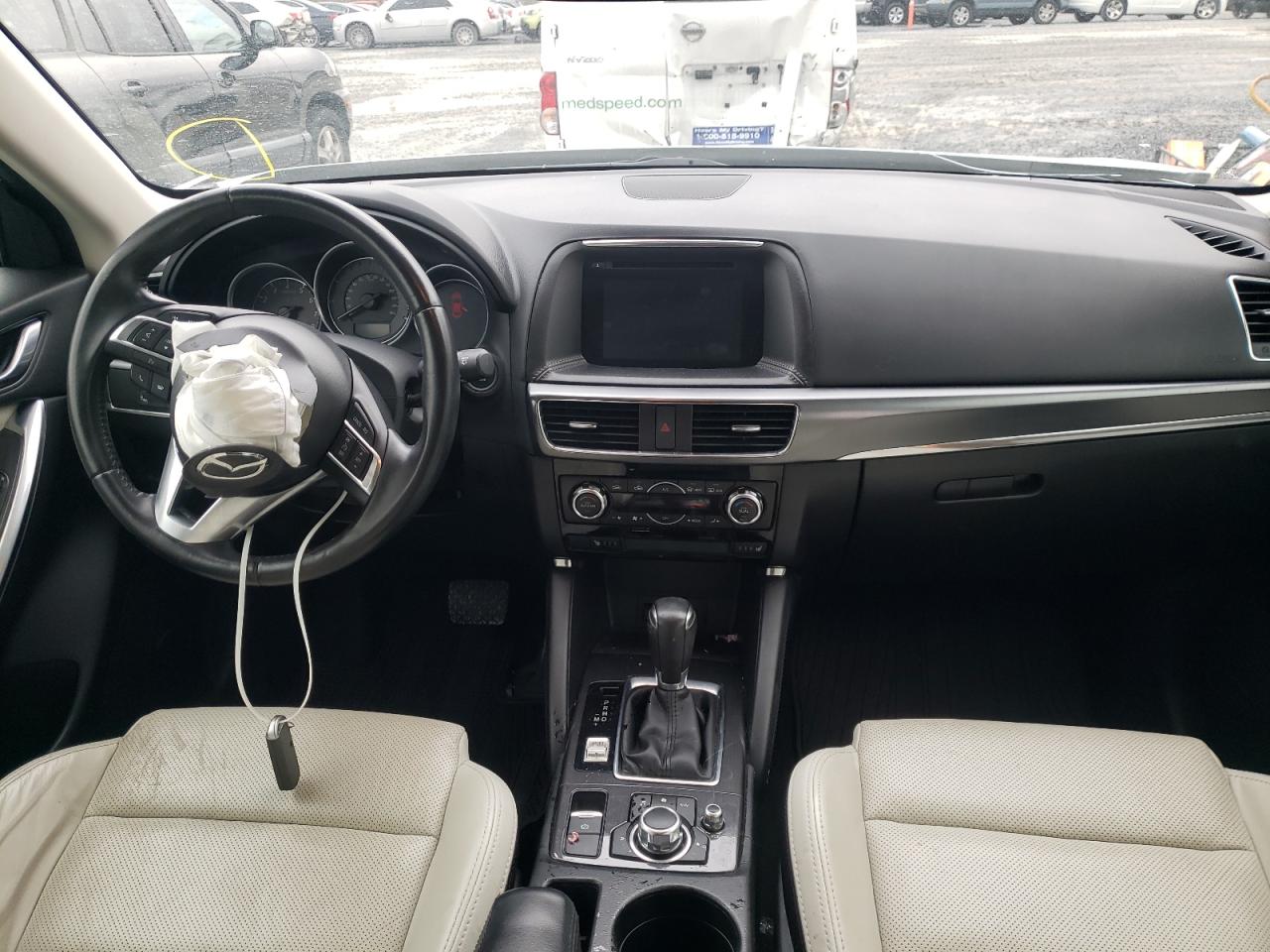 Photo 9 from auction – 2016 MAZDA CX-5 with VIN JM3KE2DYXG0658836