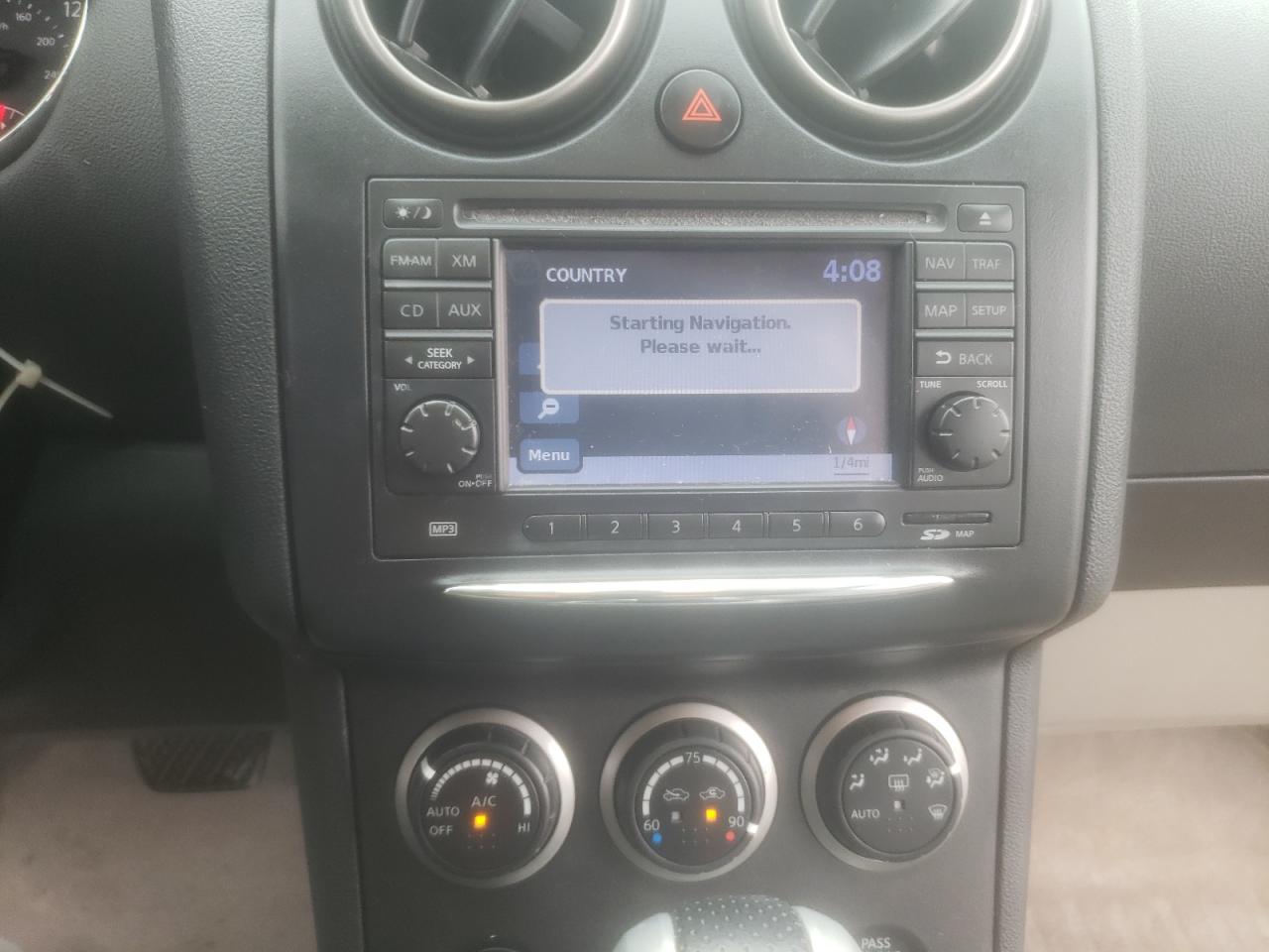 Photo 9 from auction – 2011 NISSAN ROGUE S with VIN JN8AS5MT2BW166668