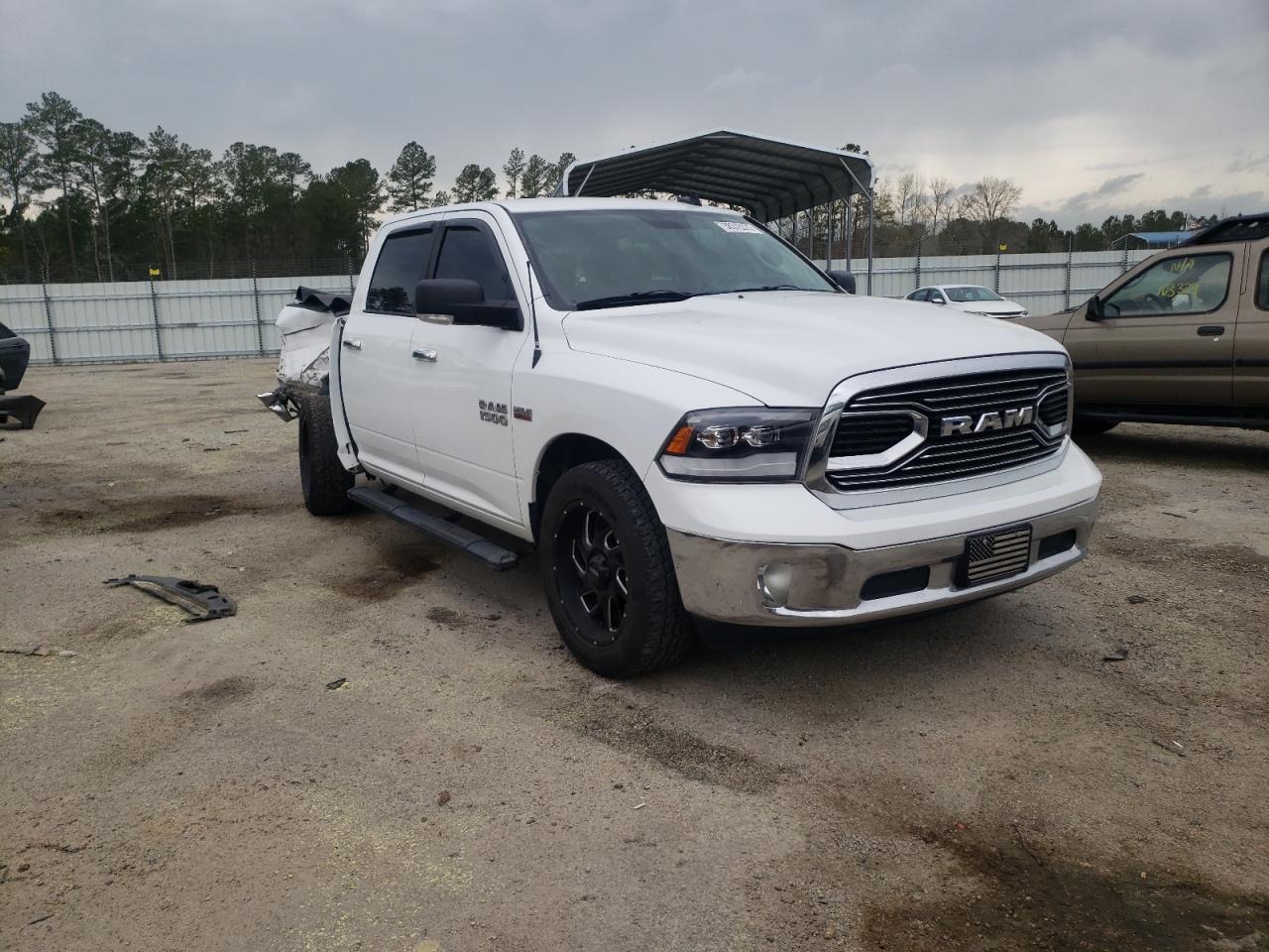 RAM 1500 SLT 2015 with VIN 3C6RR7LT4FG666009 - Photo from auction