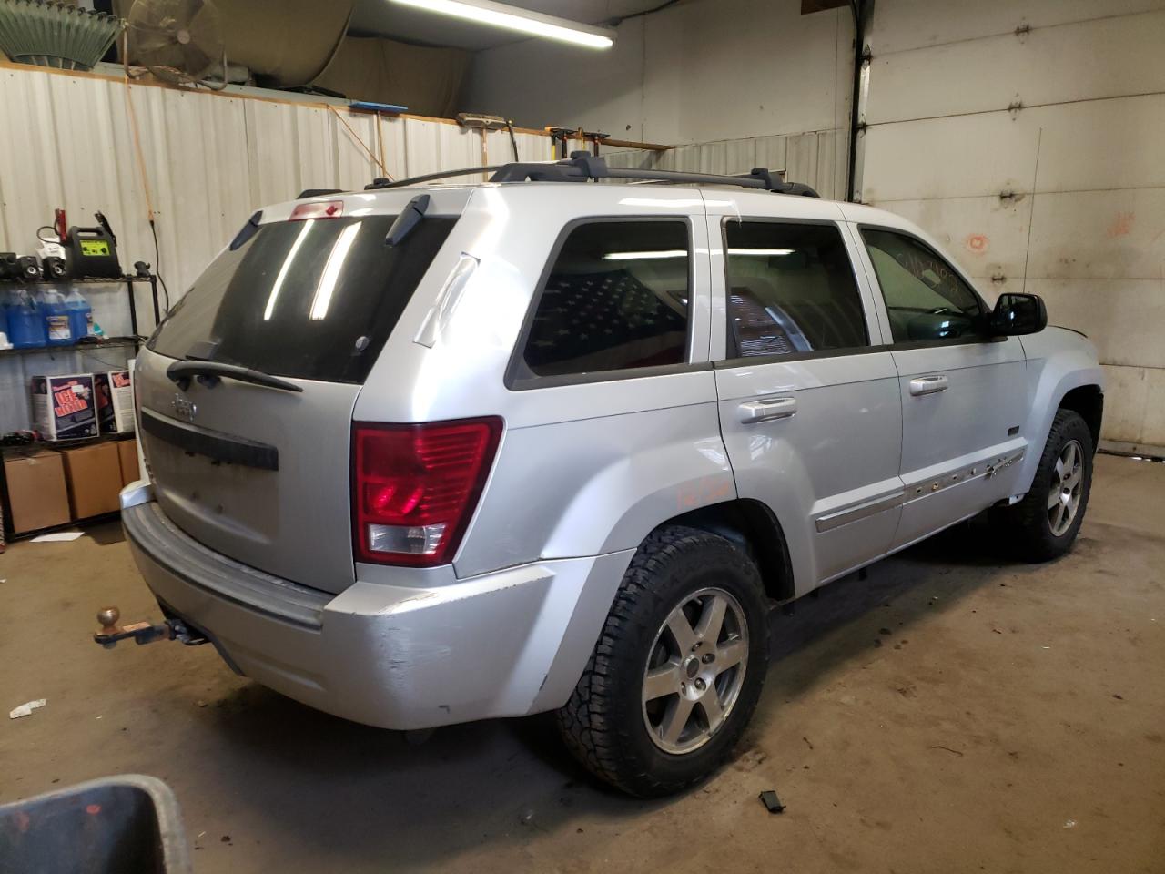 Photo 4 from auction – 2009 JEEP GRAND CHER with VIN 1J8GR48K99C553476