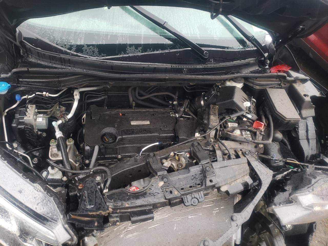 Photo 7 from auction – 2016 HONDA CR-V LX with VIN 2HKRM4H32GH703663