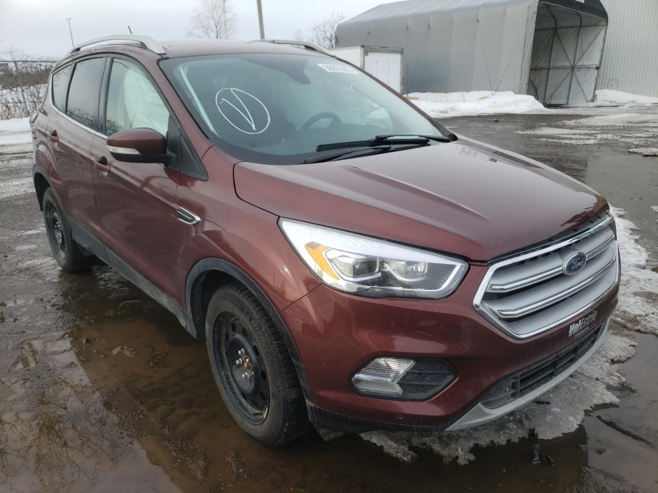 Photo 1 from auction – 2018 FORD ESCAPE TIT with VIN 1FMCU9J98JUA13474