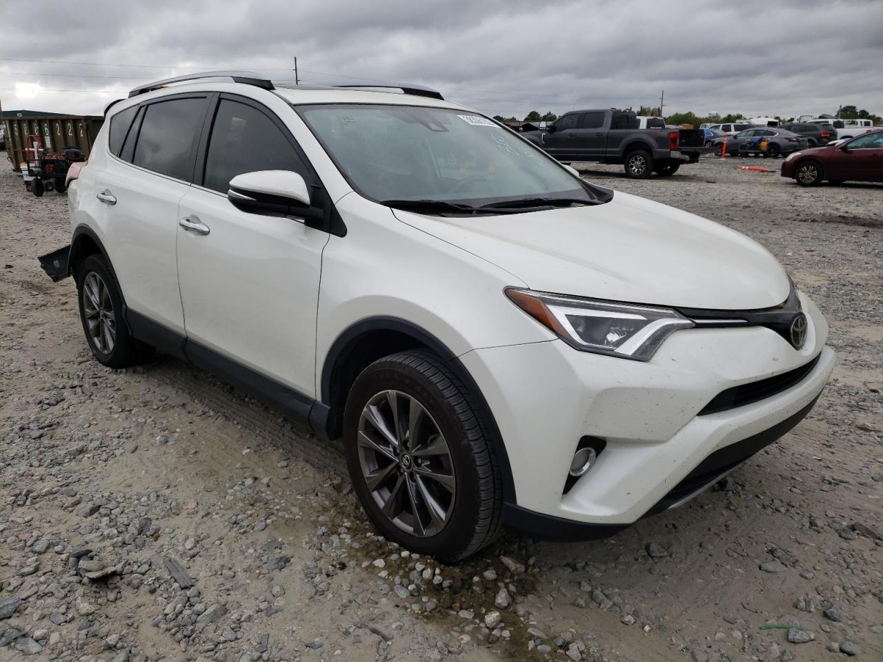 TOYOTA RAV4 LIMIT 2018 with VIN JTMYFREV9JJ744069 - Photo from auction