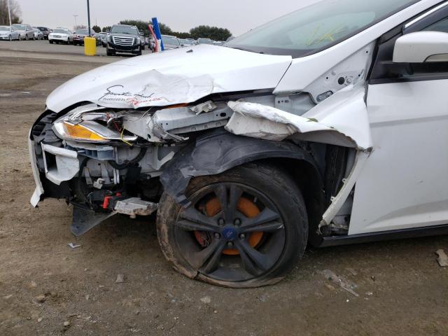 Photo 9 from auction – 2014 FORD FOCUS SE with VIN 1FADP3F28EL322758