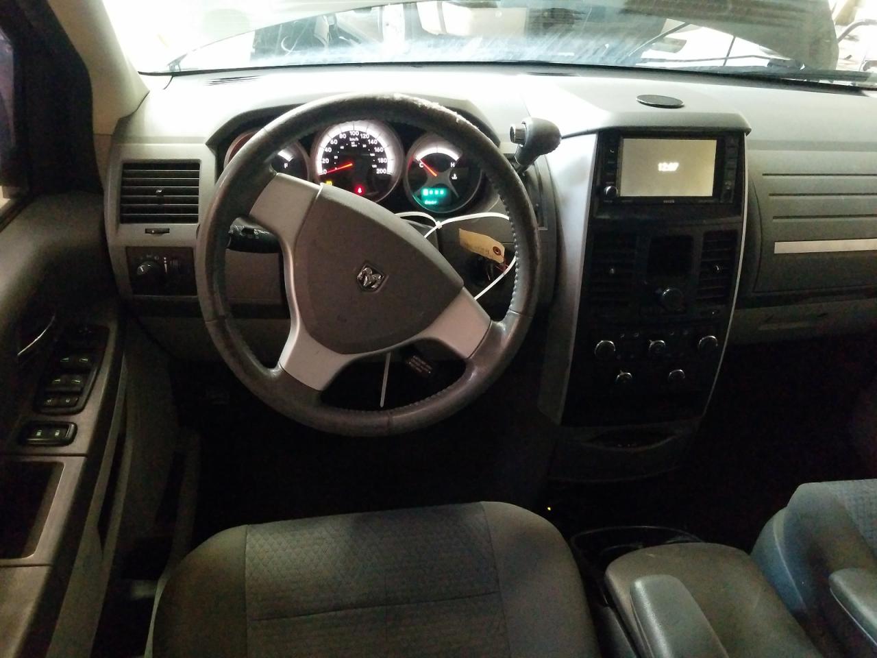 Photo 9 from auction – 2009 DODGE GRAND CARA with VIN 2D8HN44E79R627820