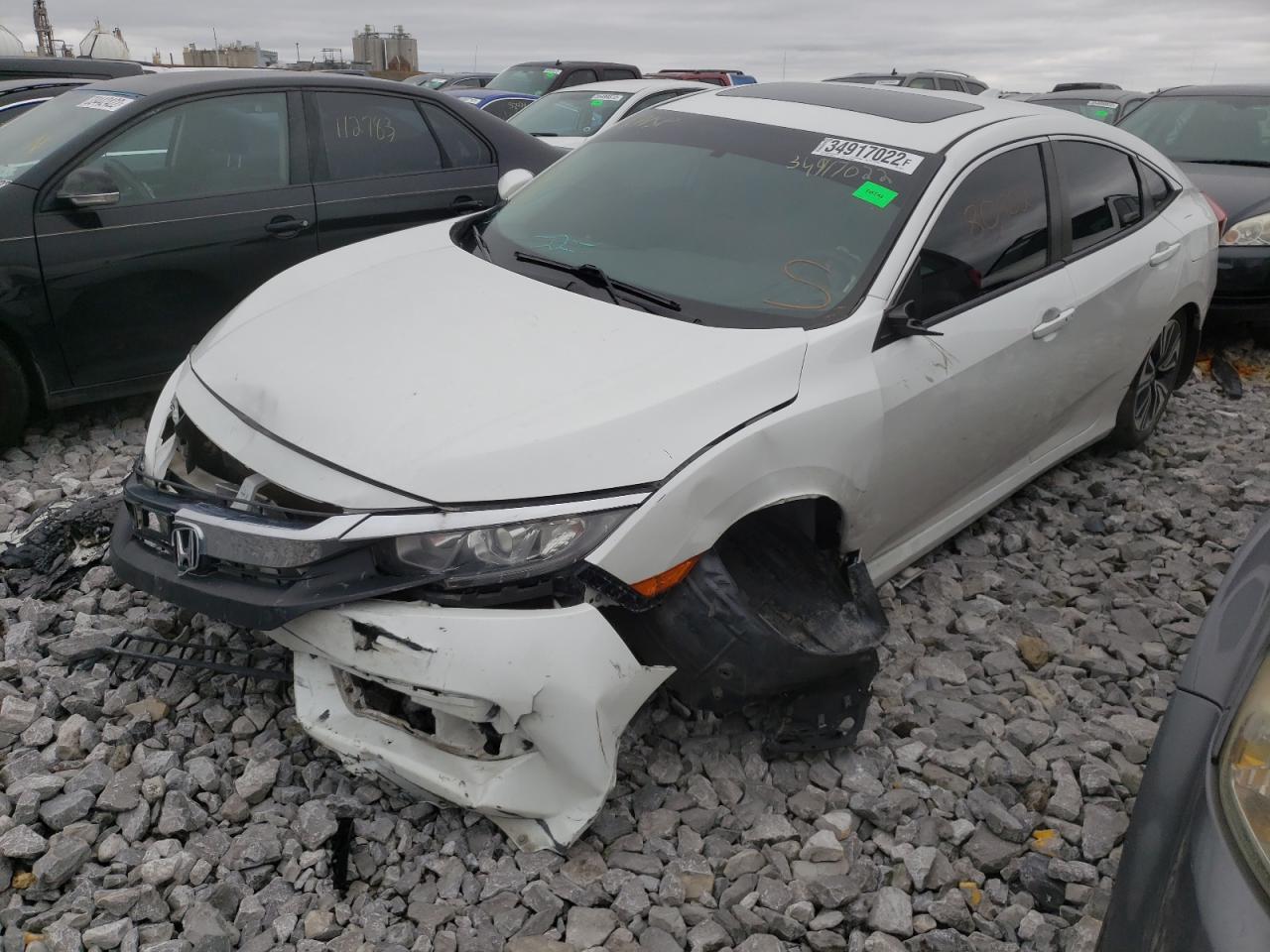 Photo 2 from auction – 2017 HONDA CIVIC EX with VIN 19XFC1F34HE029075