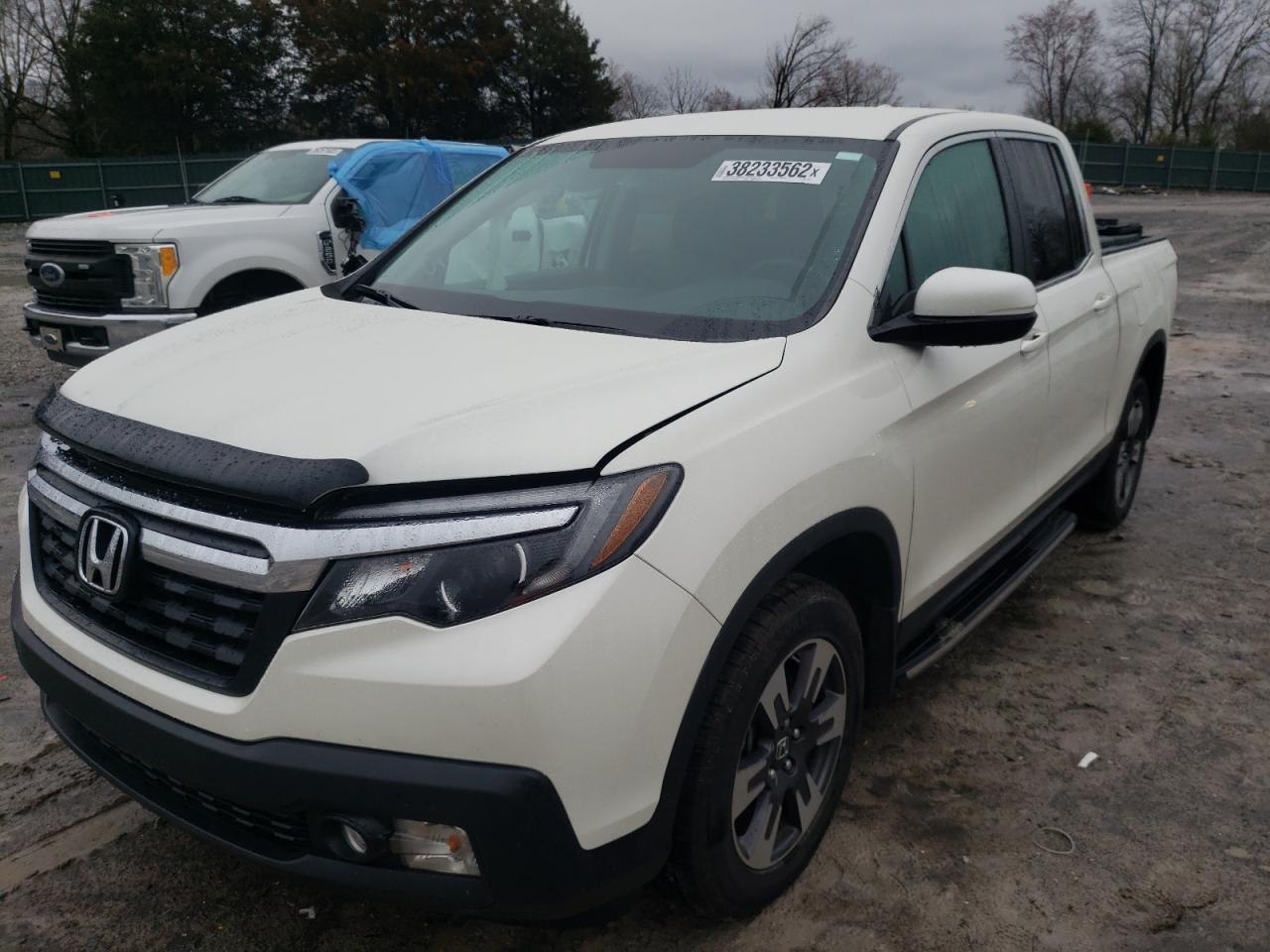 Photo 2 from auction – 2018 HONDA RIDGELINE with VIN 5FPYK3F59JB014071