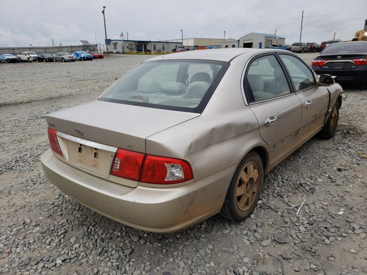 Photo 4 from auction – 2004 KIA OPTIMA LX with VIN KNAGD126245321361