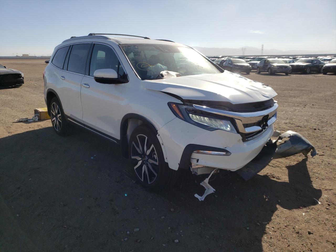 Photo 1 from auction – 2022 HONDA PILOT TOUR with VIN 5FNYF5H6XNB000930