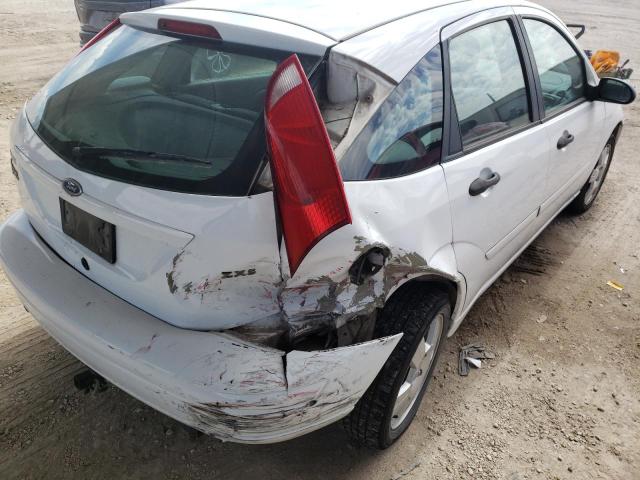 Photo 9 from auction – 2004 FORD FOCUS ZX5 with VIN 3FAHP373X4R124501