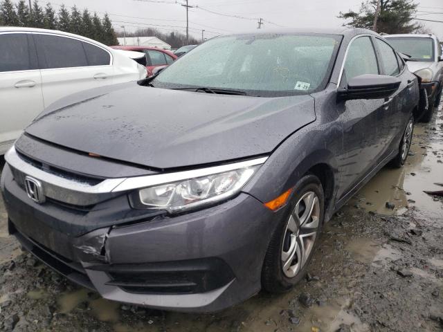 Photo 2 from auction – 2018 HONDA CIVIC LX with VIN 2HGFC2F5XJH585653