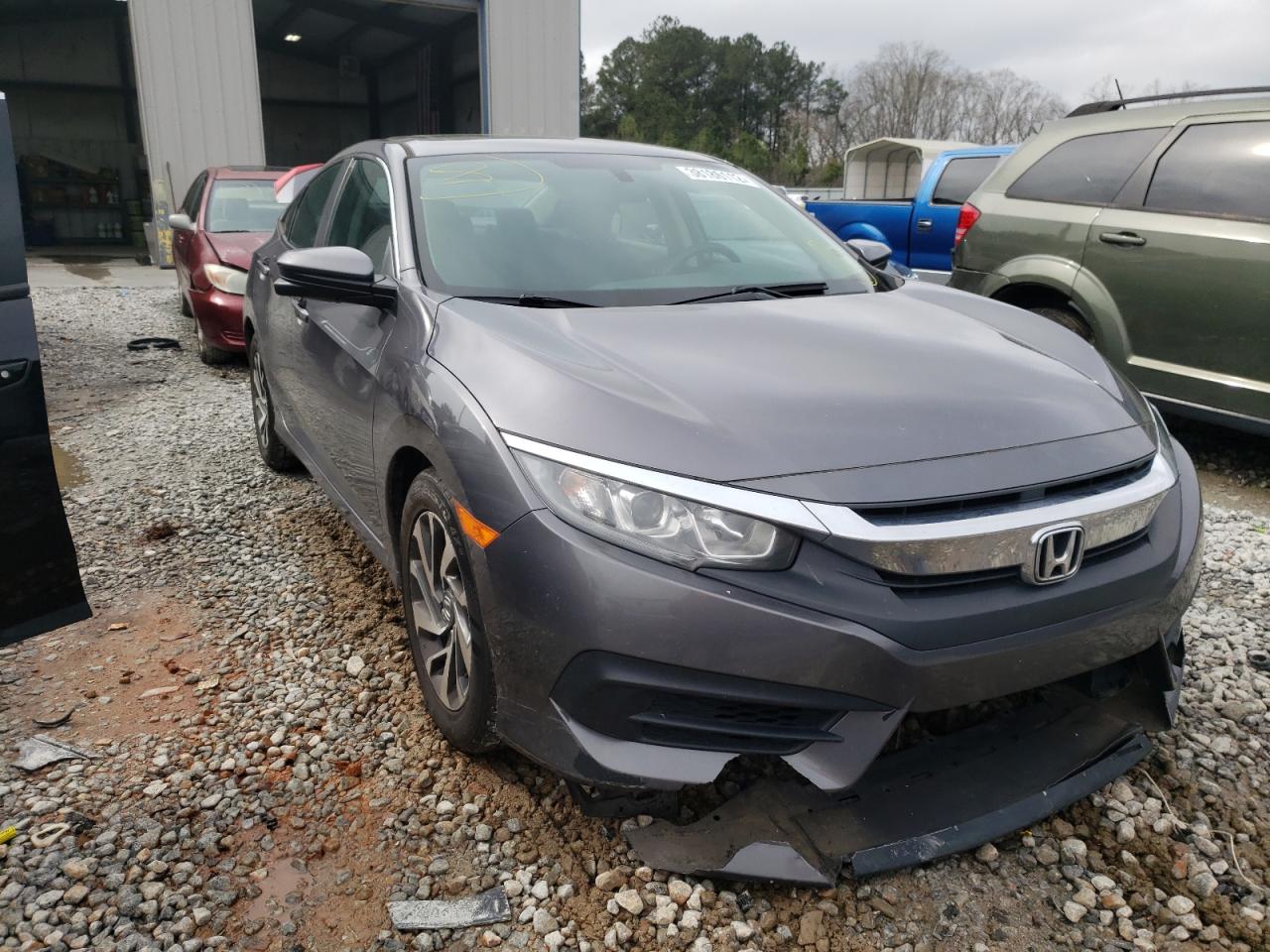 HONDA CIVIC EX 2016 with VIN 19XFC2F72GE056217 - Photo from auction