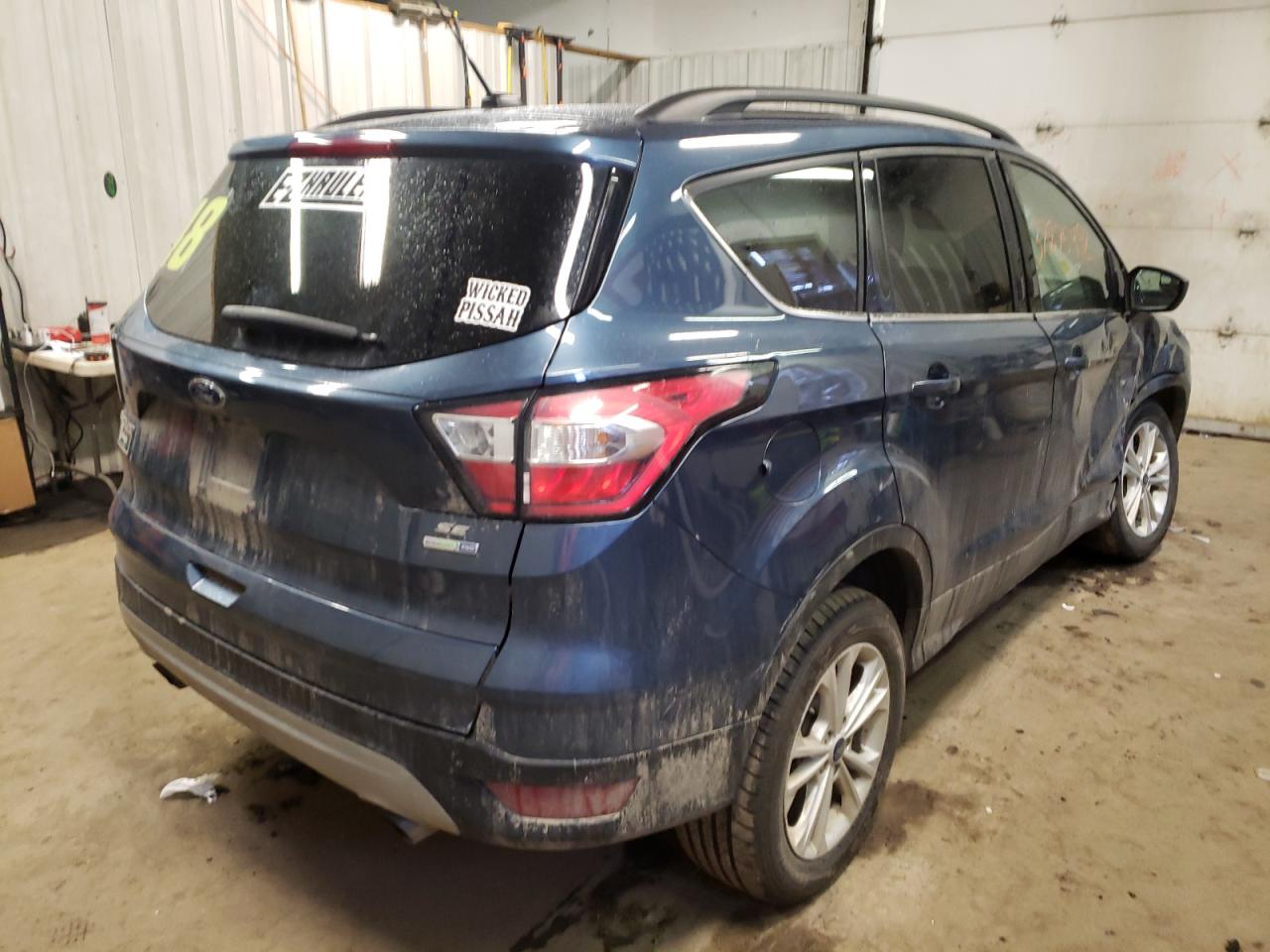 Photo 4 from auction – 2018 FORD ESCAPE SE with VIN 1FMCU9GD6JUB57956