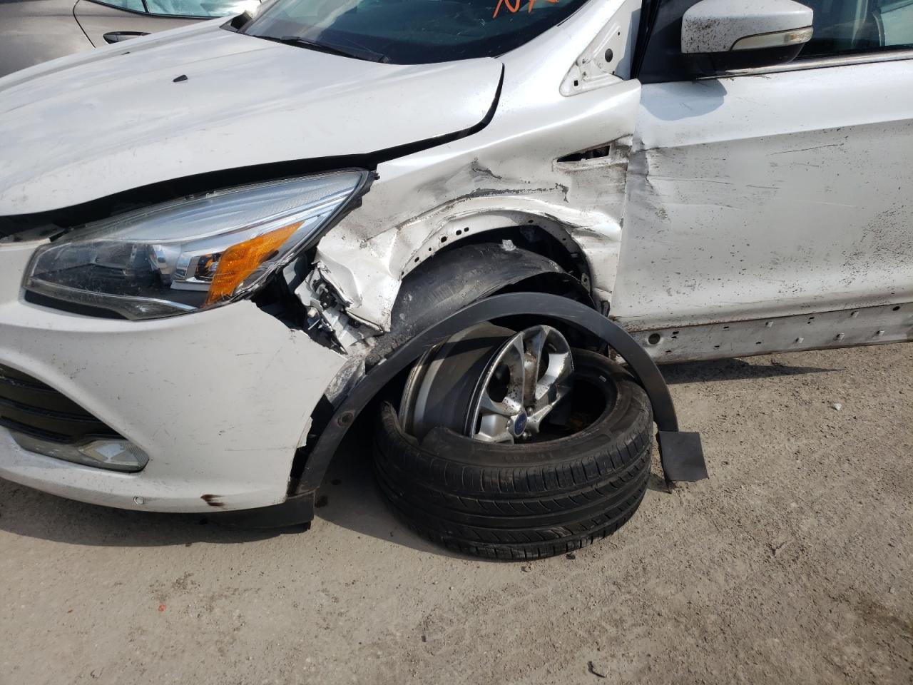 Photo 9 from auction – 2015 FORD ESCAPE TIT with VIN 1FMCU0JX6FUC23282