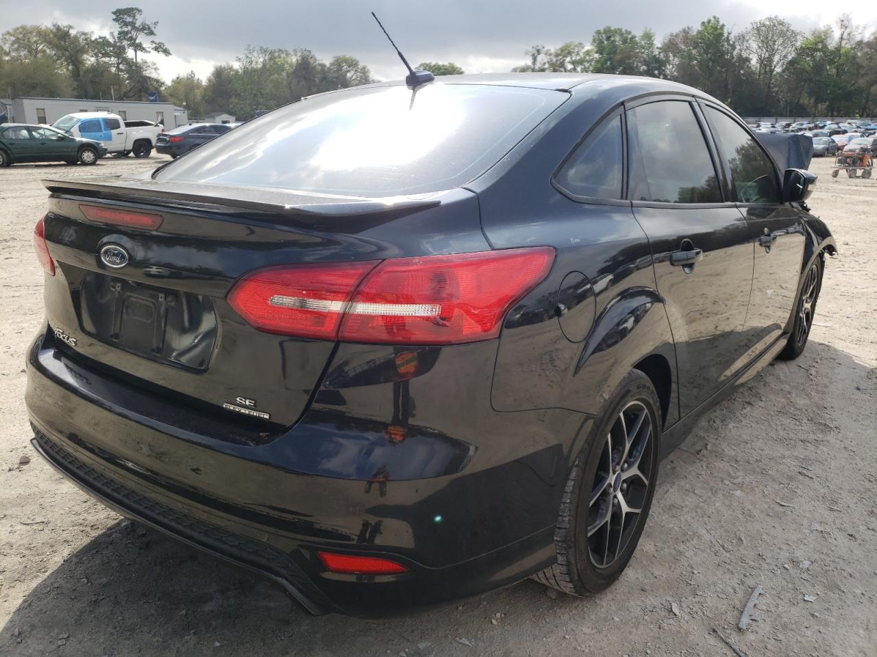 Photo 4 from auction – 2015 FORD FOCUS SE with VIN 1FADP3F25FL339101