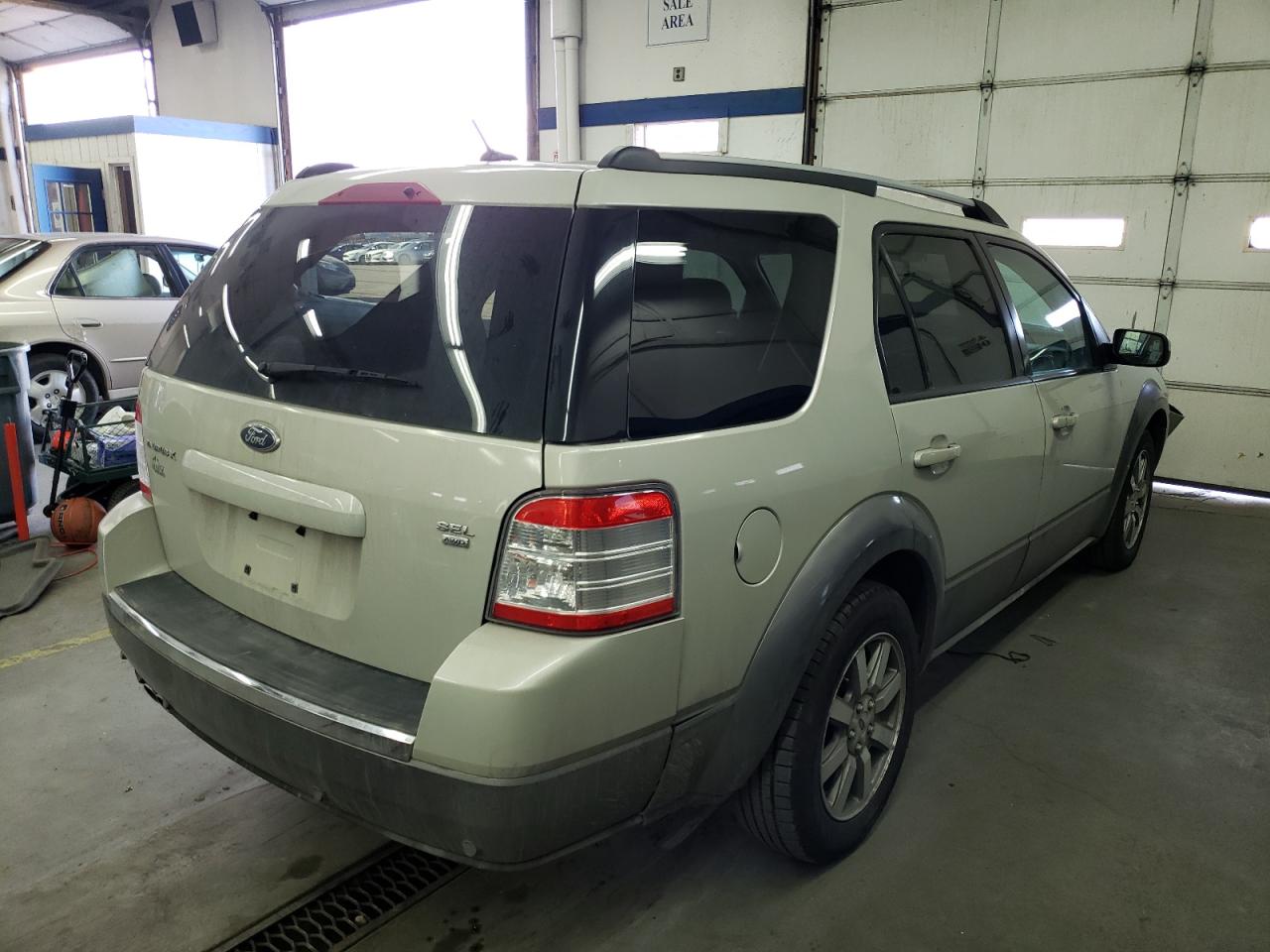 Photo 4 from auction – 2008 FORD TAURUS X S with VIN 1FMDK05W78GA19734