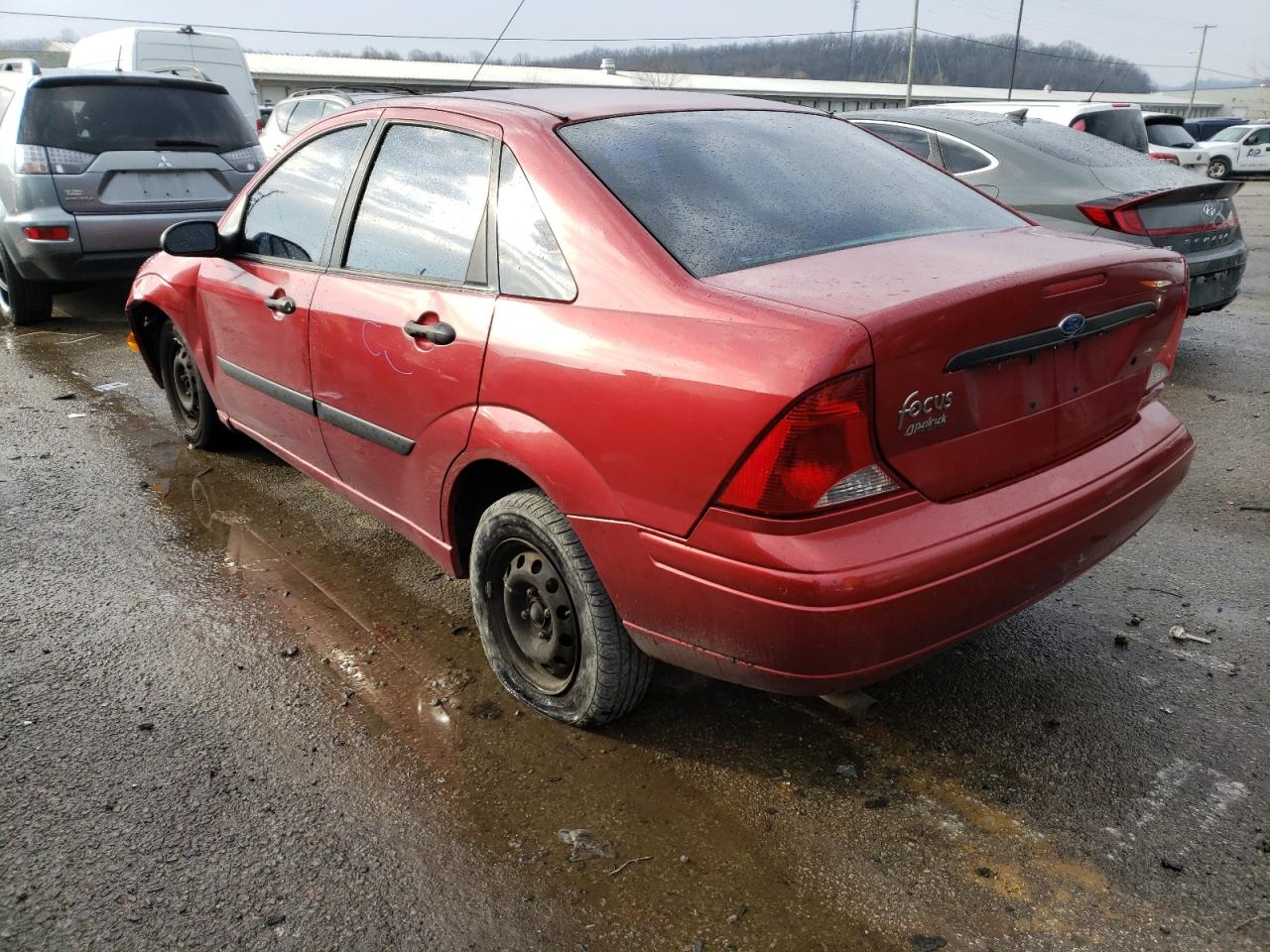 Photo 3 from auction – 2004 FORD FOCUS LX with VIN 1FAFP33Z84W152022
