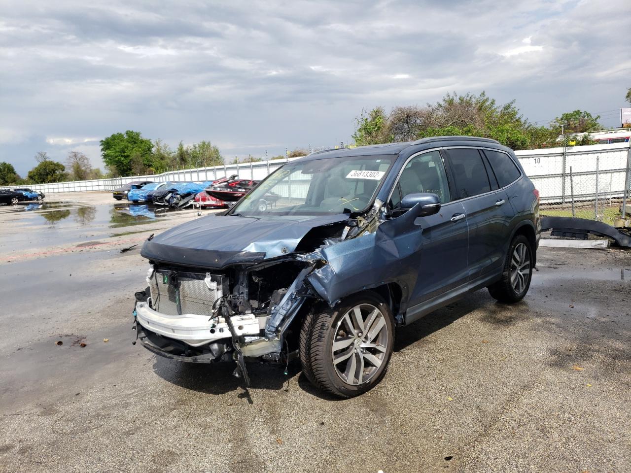 Photo 2 from auction – 2016 HONDA PILOT TOUR with VIN 5FNYF5H90GB031231
