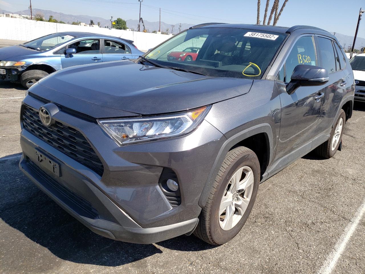 Photo 2 from auction – 2021 TOYOTA RAV4 XLE with VIN 2T3W1RFVXMC111754