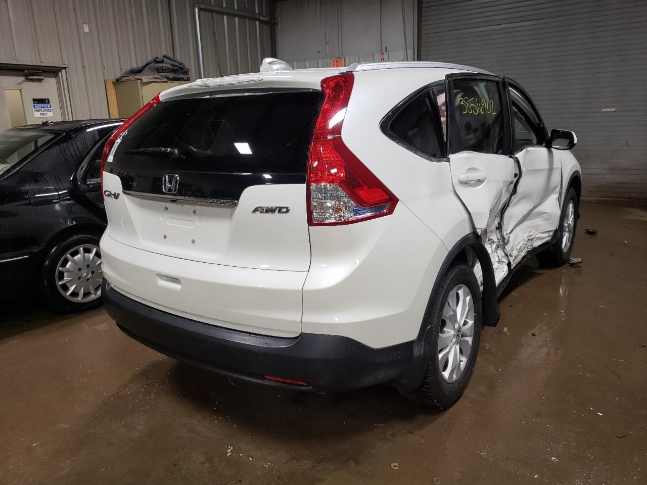 Photo 4 from auction – 2012 HONDA CR-V EXL with VIN 5J6RM4H78CL036908