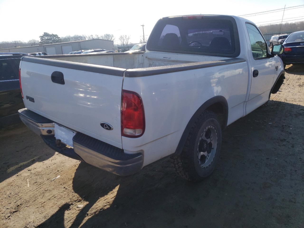Photo 4 from auction – 2001 FORD F150 with VIN 1FTRF18W91NB33378
