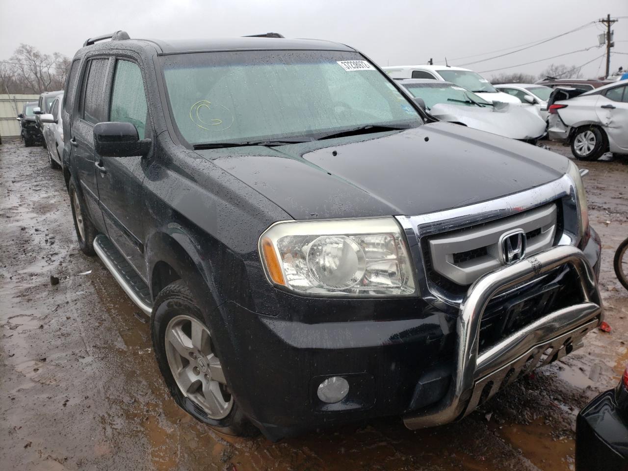 HONDA PILOT EX 2011 with VIN 5FNYF4H48BB014538 - Photo from auction