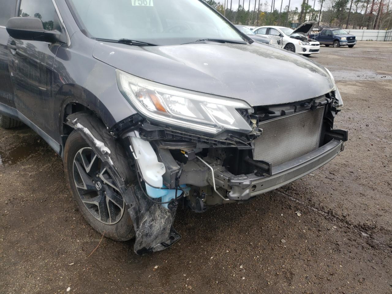 Photo 9 from auction – 2016 HONDA CR-V SE with VIN 2HKRM3H42GH526356