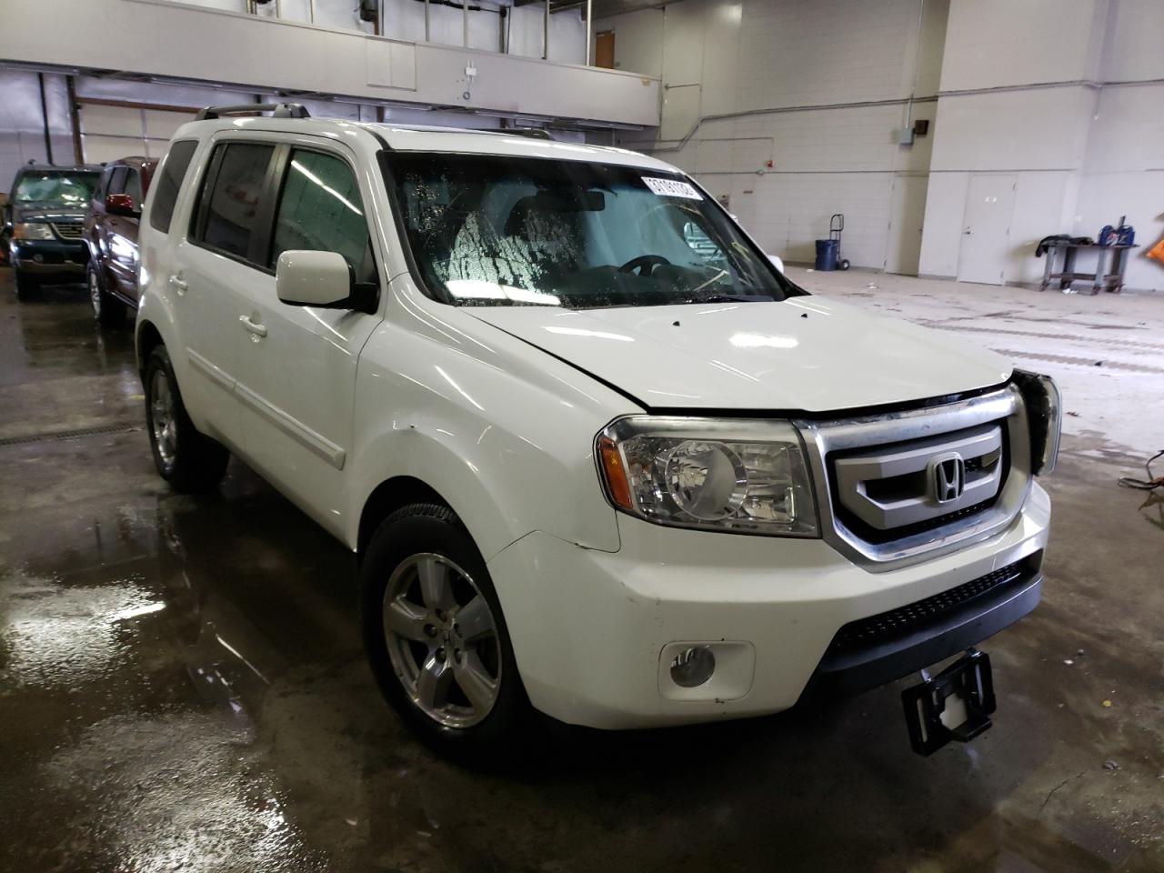 HONDA PILOT EXL 2011 with VIN 5FNYF4H65BB039737 - Photo from auction