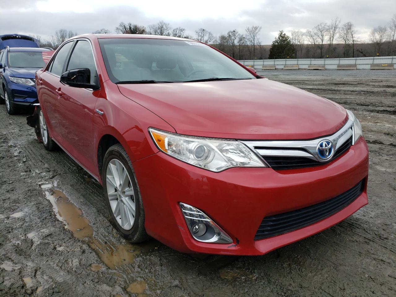 TOYOTA CAMRY HYBR 2012 with VIN 4T1BD1FK7CU036479 - Photo from auction