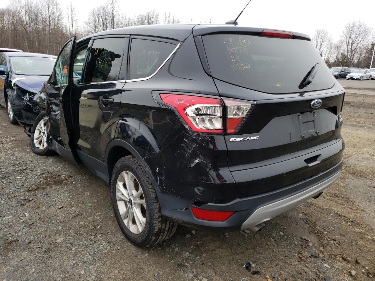 Photo 3 from auction – 2017 FORD ESCAPE SE with VIN 1FMCU0G90HUA39807