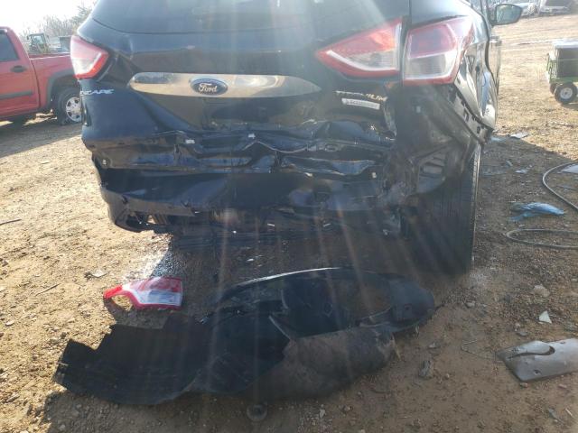 Photo 9 from auction – 2014 FORD ESCAPE TIT with VIN 1FMCU0J97EUA70296