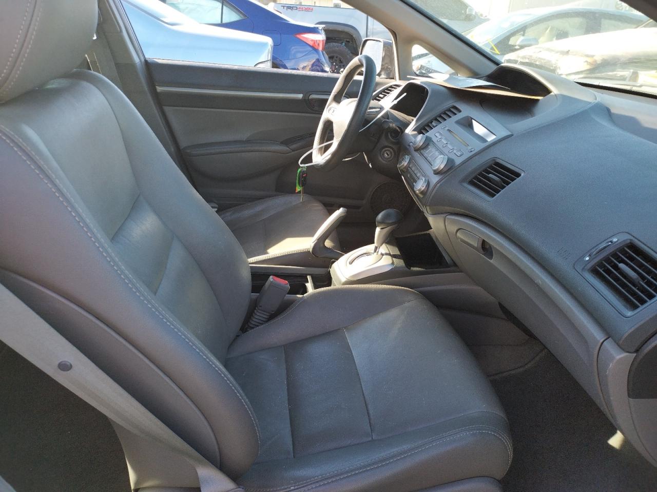 Photo 5 from auction – 2010 HONDA CIVIC EX with VIN 19XFA1F88AE035551