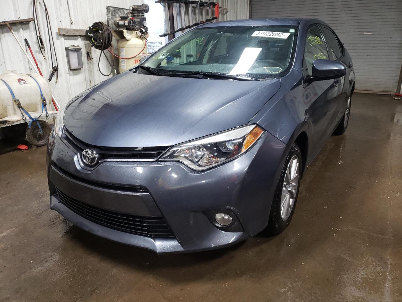 Photo 2 from auction – 2015 TOYOTA COROLLA L with VIN 5YFBURHE6FP252321