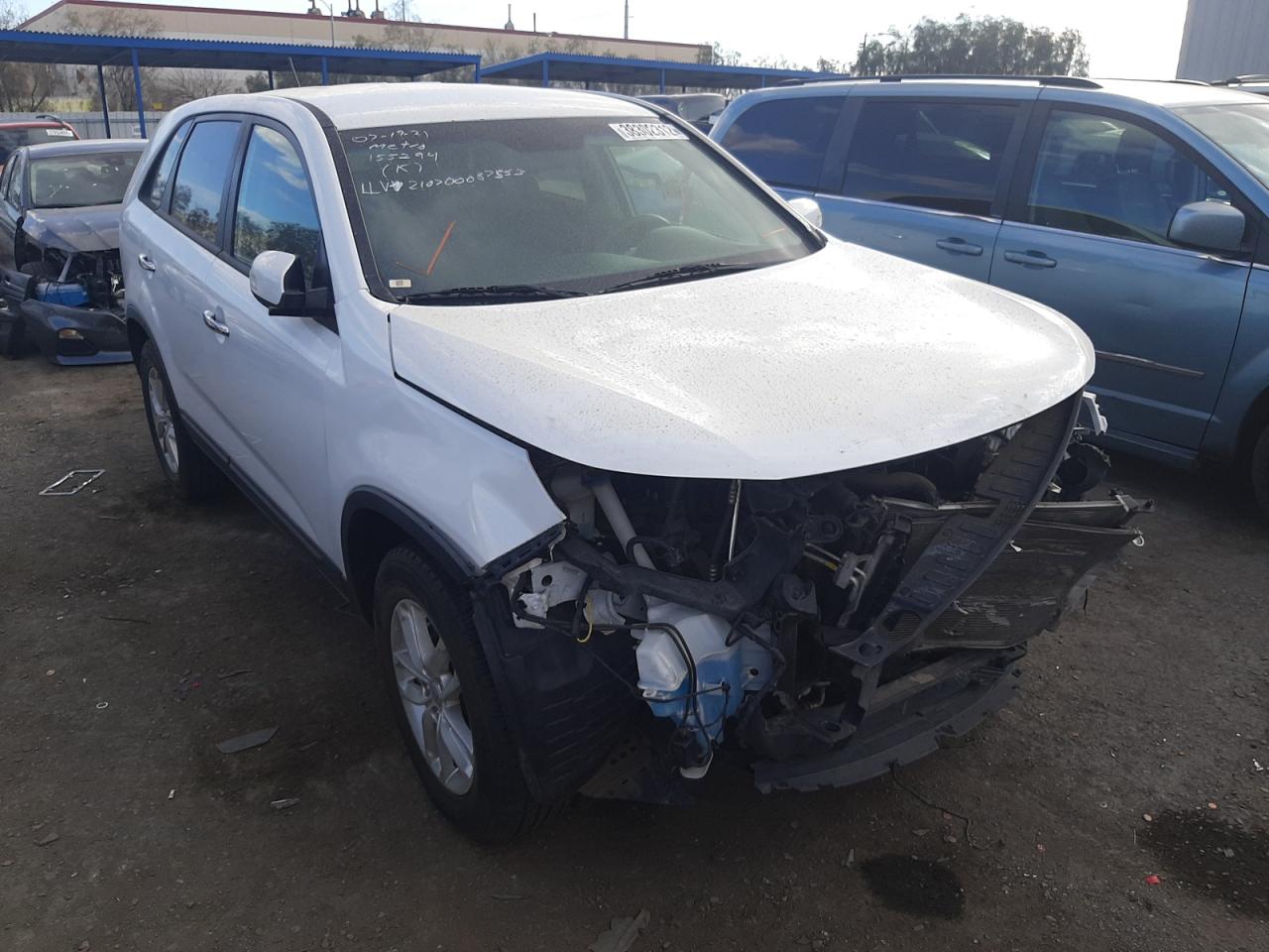 KIA SORENTO LX 2015 with VIN 5XYKT3A62FG563171 - Photo from auction