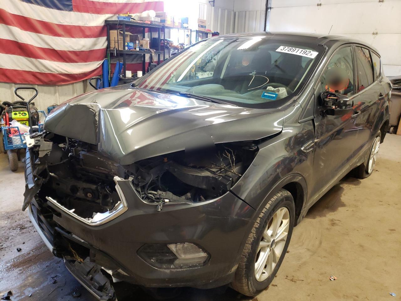 Photo 2 from auction – 2017 FORD ESCAPE SE with VIN 1FMCU9GD0HUC27736