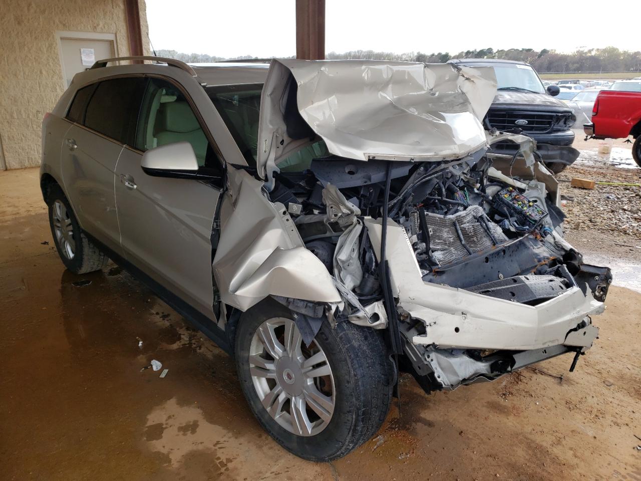 CADILLAC SRX LUXURY 2011 with VIN 3GYFNAEYXBS600398 - Photo from auction
