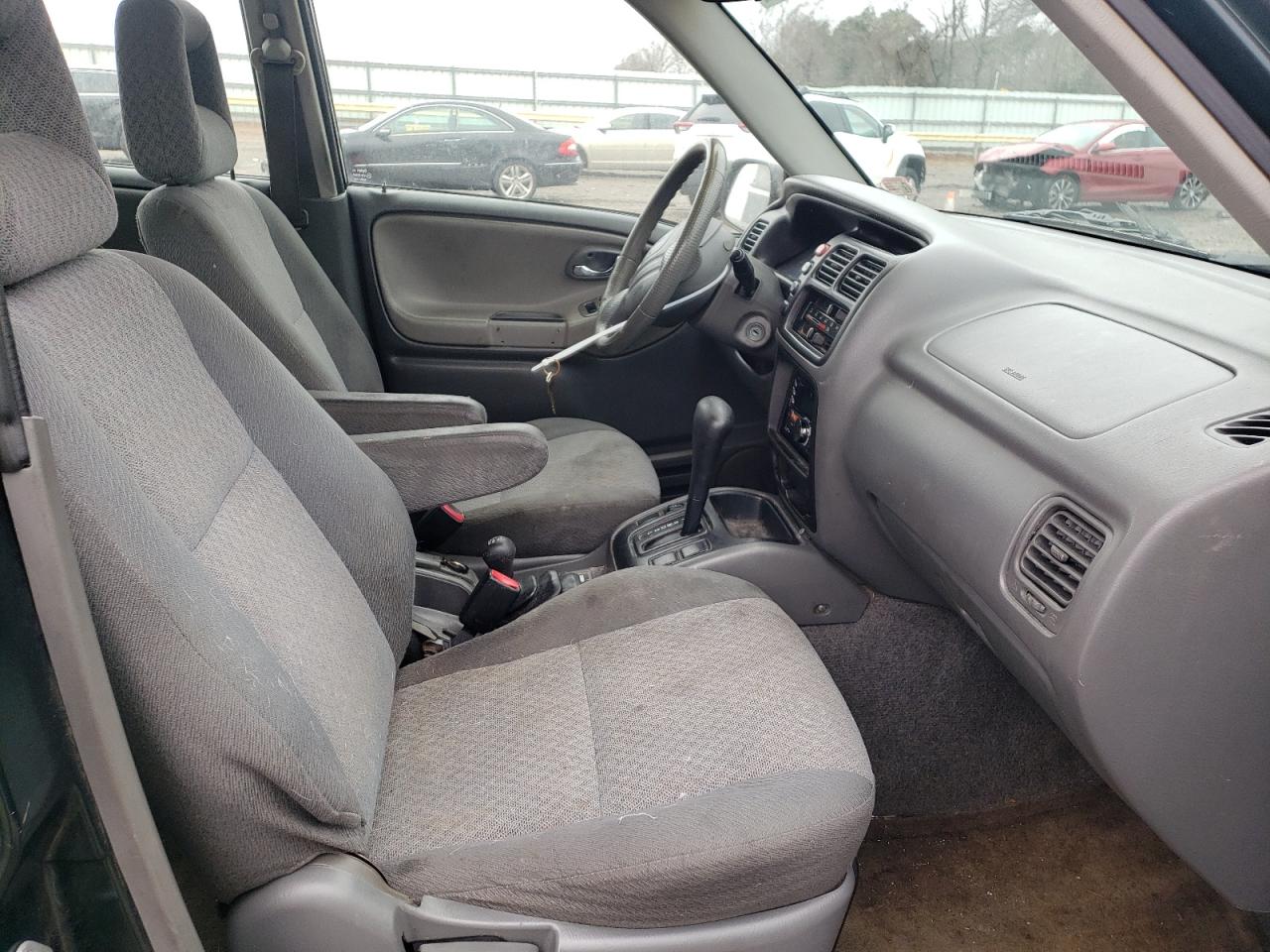 Photo 5 from auction – 2003 CHEVROLET TRACKER with VIN 2CNBJ13C936920654