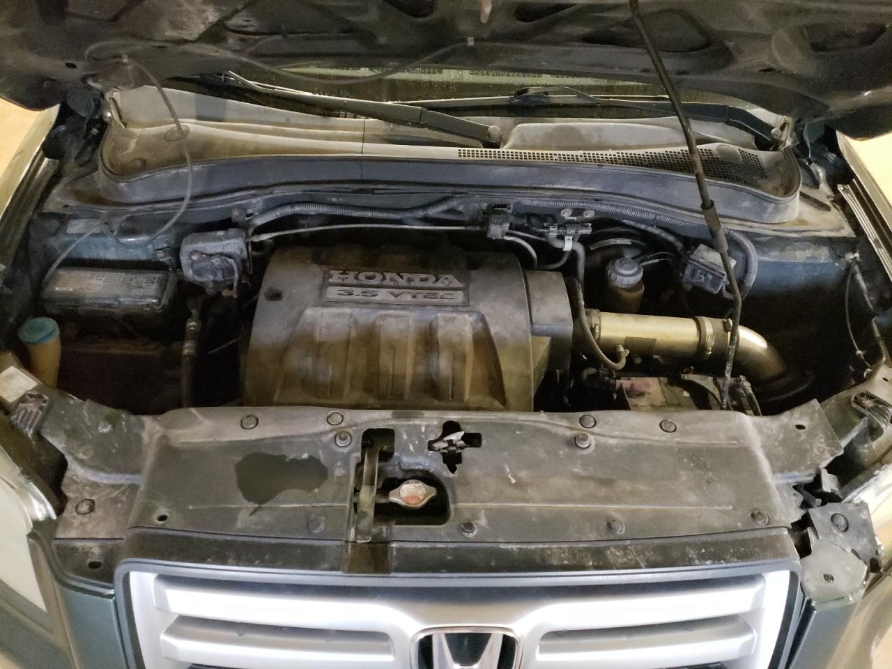 Photo 7 from auction – 2006 HONDA PILOT EX with VIN 2HKYF18426H554926